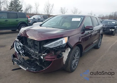 2021 Ford Edge Titanium z USA, uszkodzony, nr VIN 2FMPK4K95MBA38996